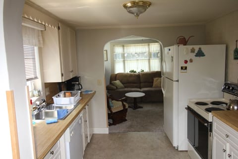 View From Dining Area Through Kitchen to Living Area.