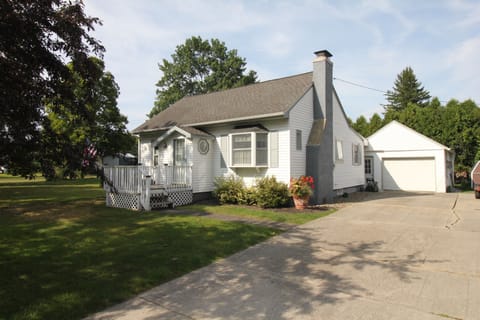 Front of House From Road,
shared Concrete Driveway, Garage