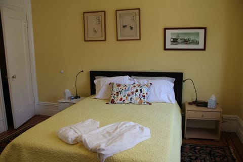 Bedroom with Queen Bed, bedside tables with reading lamps