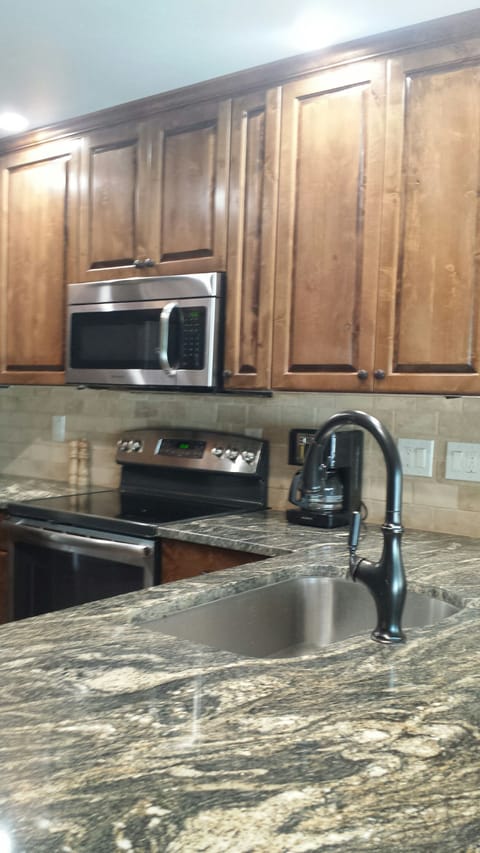 Granite countertop and stainless steel appliances