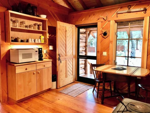 Mini-fridge, microwave, stovetop, coffee/tea maker