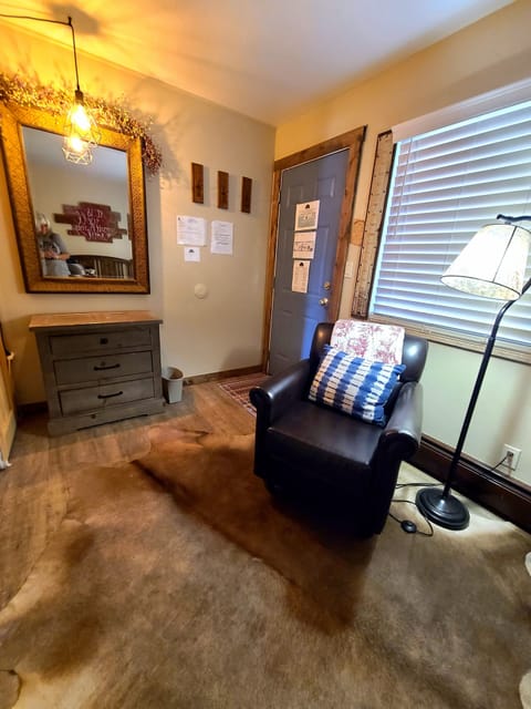 2nd bedroom with cowhide rug and twin trundle