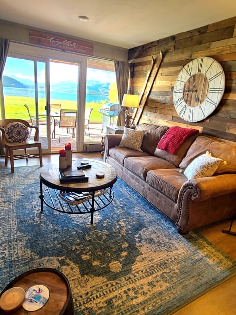 Queen sleeper sofa and large picture windows that look out over lake