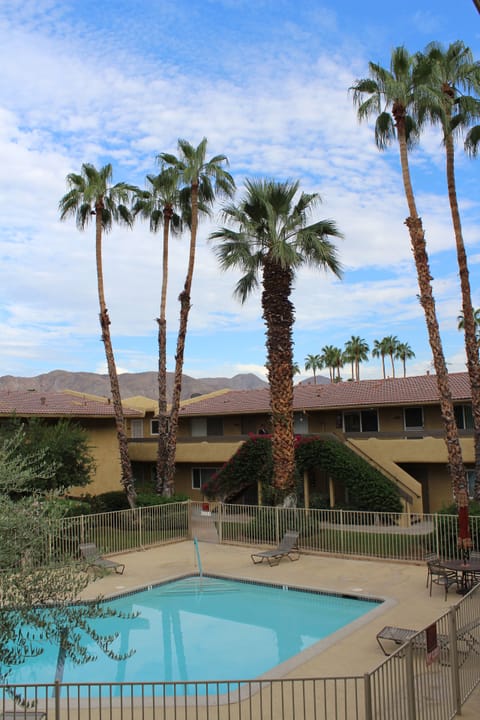 The front patio overlooks the pool