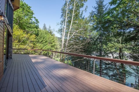 Aspens and firs make the upper-level deck feel like you're in the tree tops!