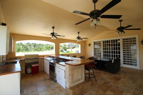 Main level terrace with a Full Kitchen and Grill.