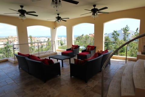 Relaxing Main level  Seating Area with awesome view of village and Caribbean
