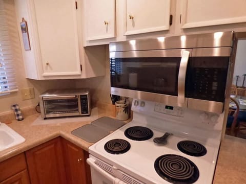 Kitchen stove, microwave, and air fryer