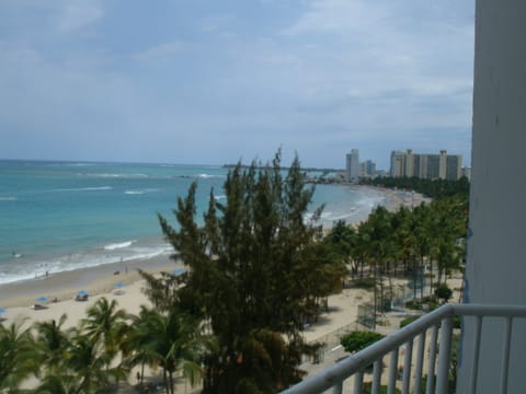 On the beach, sun loungers, beach towels