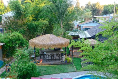 The backyard. Cottage Roof is on the right. Center is the palapa/outdoor bbq.
