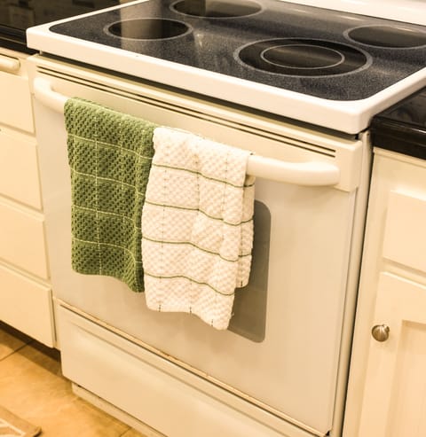 The kitchen is equipped with 4 burner  stove, oven and microwave/convection 