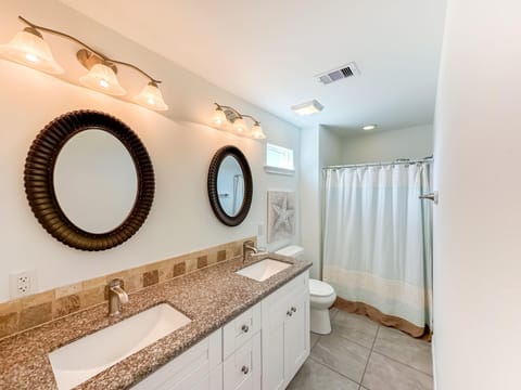 Combined shower/tub, hair dryer, towels, toilet paper