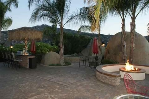 Lots of fun, BBQ, Refrigerator, stove, spa, fire pit and sun room.