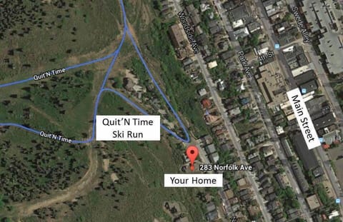 House location in reference to ski run and main street.