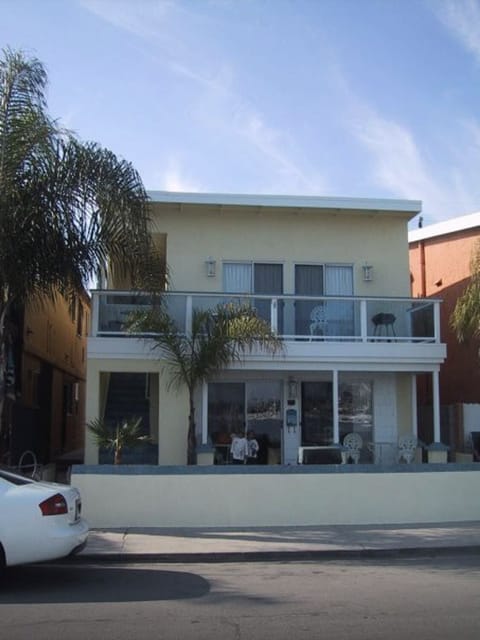 Exterior with front patio across the street is Bay Shore beach