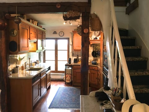 kitchen , stairs up to bedroom