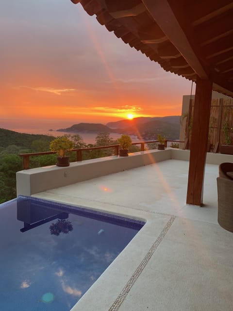 Infinity Pool, Terrace, and Sunset