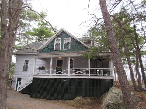 The cottage is secluded uphill from Shore Rd, with ample parking space.