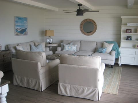 Living room with water view
Large flatscreen TV