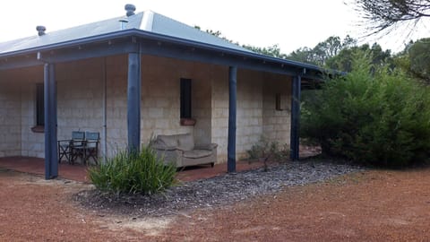 Side/rear view of house - verandahs all the way around