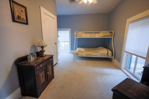 rear bedroom with a twin and full size bed