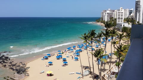 On the beach, sun loungers, beach towels