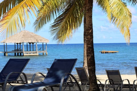 On the beach, sun loungers, beach towels