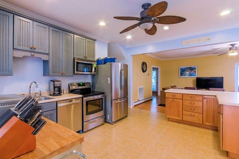large open kitchen with all new stainless steel appliances