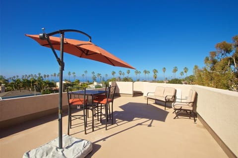 Roof Deck with seating and cantilever umbrella