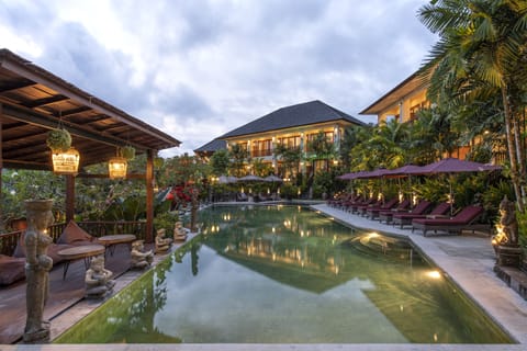 Outdoor pool, an infinity pool, sun loungers