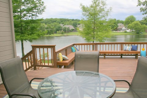 Large deck with BBQ, bench seating and dining seating