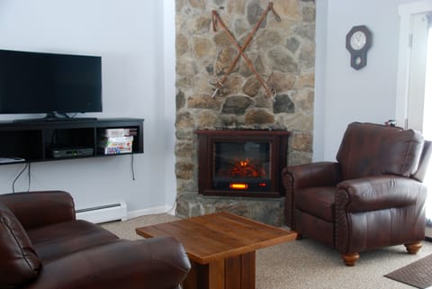 Flat-screen TV, fireplace