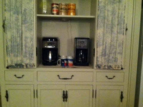 2 Coffee pots in coffee bar.