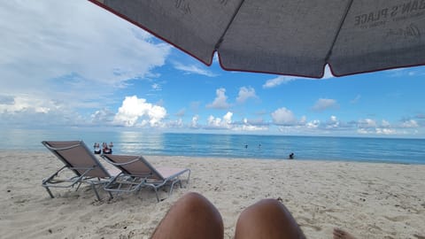 On the beach, sun loungers, beach towels