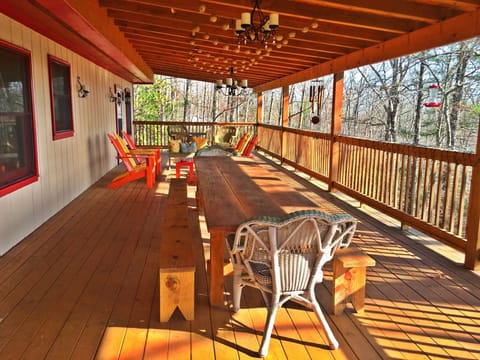 The deck on the main level with 12' table and benches for outdoor dining.
