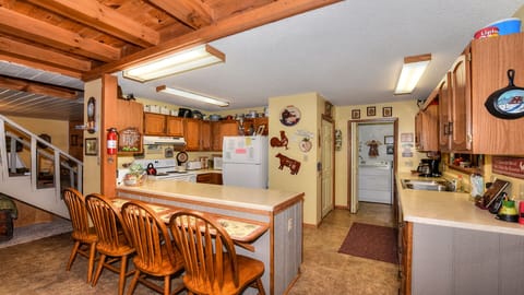 Kitchen with island and additional sitting area