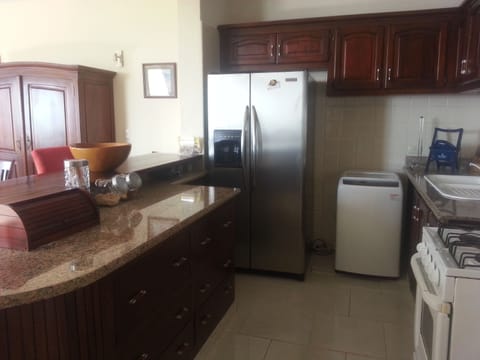 Fridge, microwave, cookware/dishes/utensils