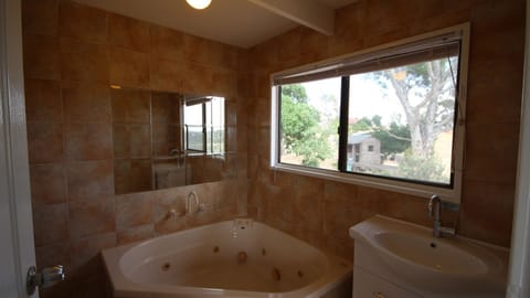 Combined shower/tub, hair dryer, towels, soap