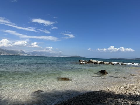 On the beach, sun loungers, beach towels