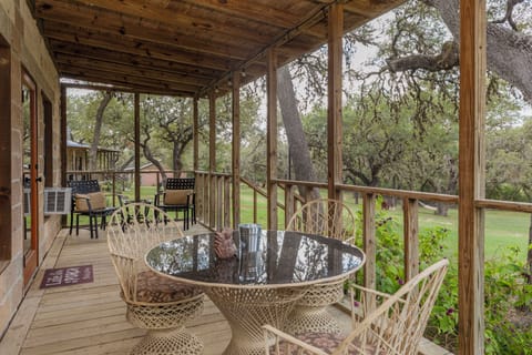 Private porch with dining table & seating
