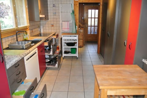 View of the working area of the kitchen, in the direction of the entrance hall.