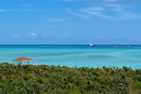 On the beach, sun loungers, beach towels