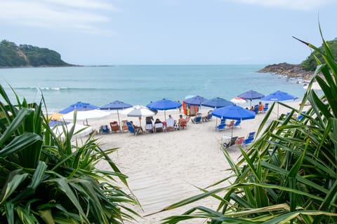 On the beach, sun loungers, beach towels