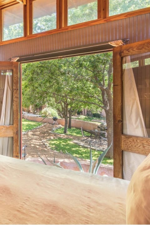 Beautiful view from your bed with the French doors open - very romantic!