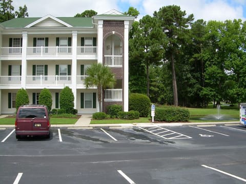 Front of Condo with Golf Course Behind Unit