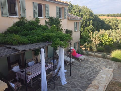 South facing terrace with Wisteria covered pergola
