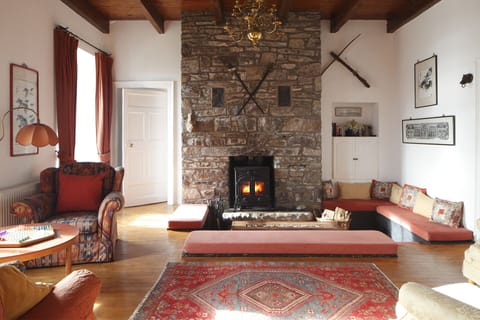  Sitting room with sunken seating area and  wood burning stove