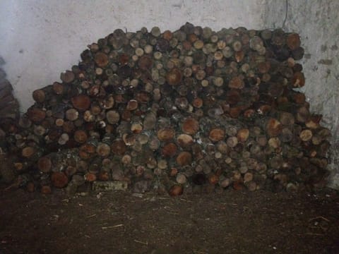Wood stored in one of our barns.