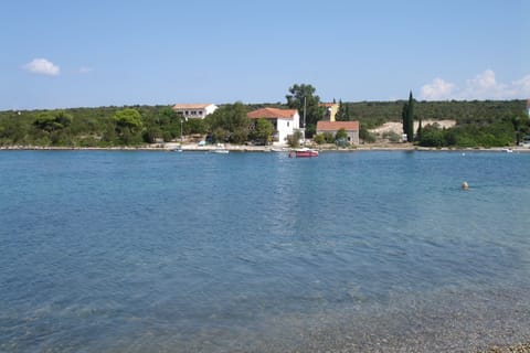 Mirce, through Loviste, at end of peninsula, good for hermit crabs