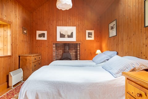 Lake cottage beds; local art work.